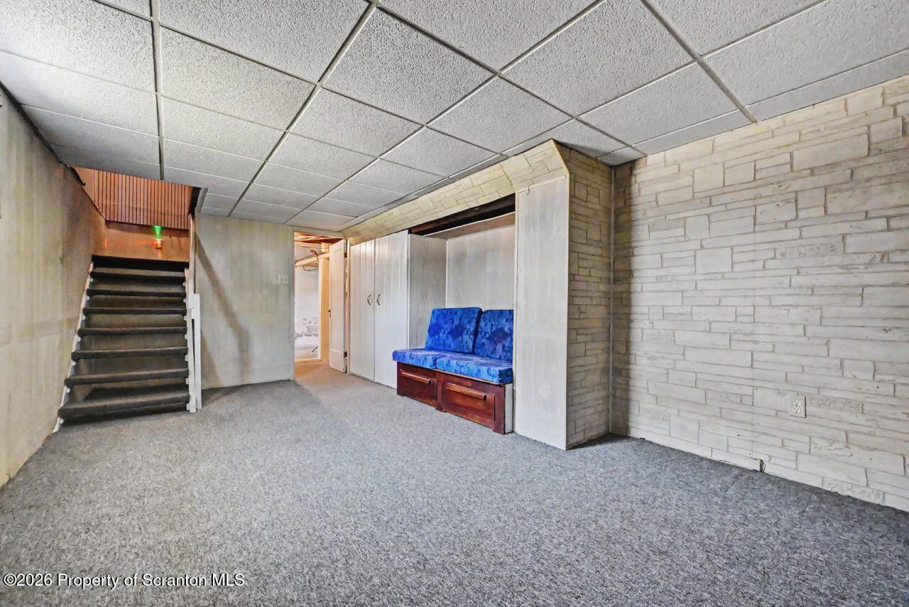 502 Layton Road Clarks Summit, PA 18411 - Photo 35 of 42 a view of livingroom with stairs