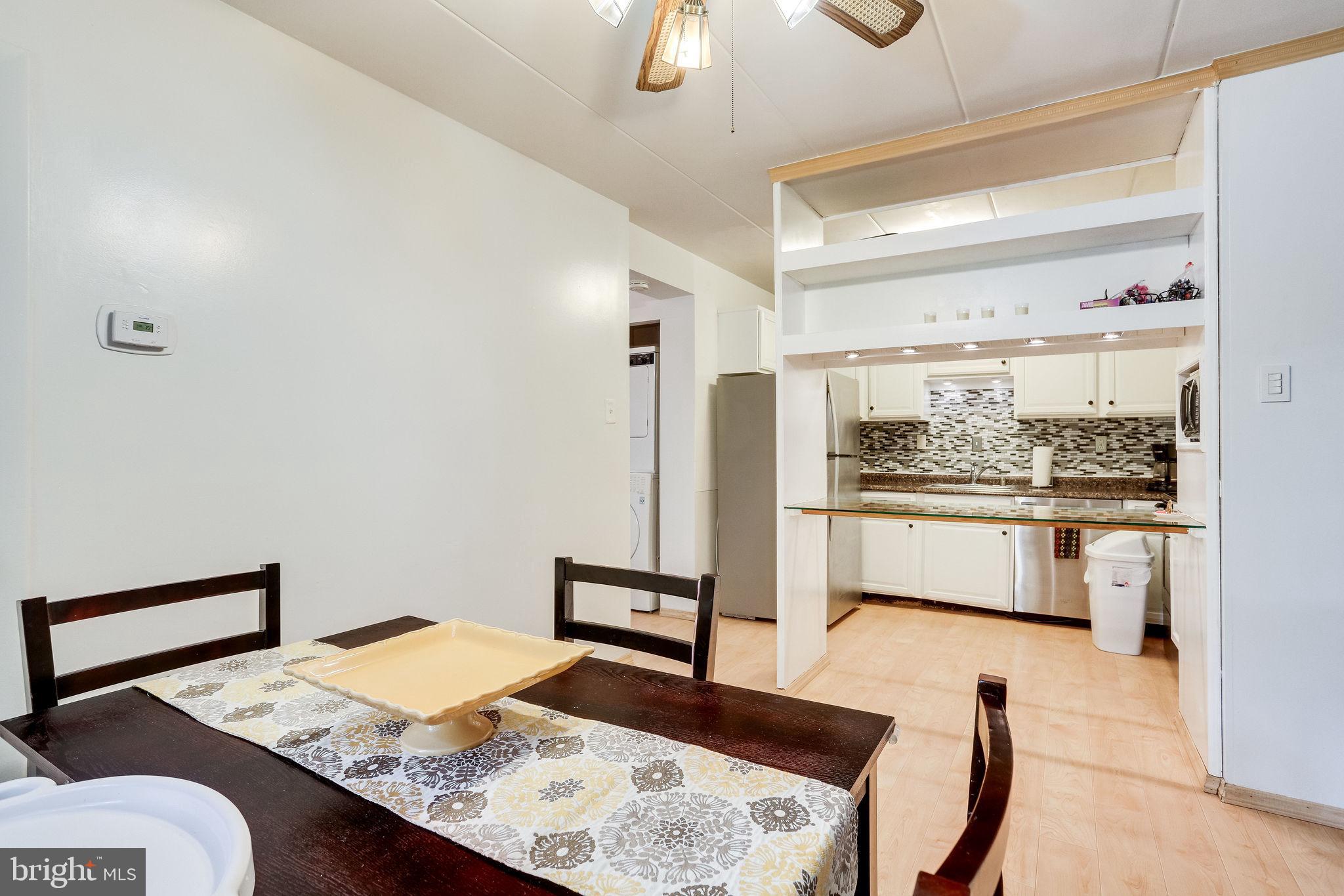 6280 Edsall Road, Unit 201 Alexandria, VA 22312 - Photo 11 of 40 Dining opens up to the kitchen