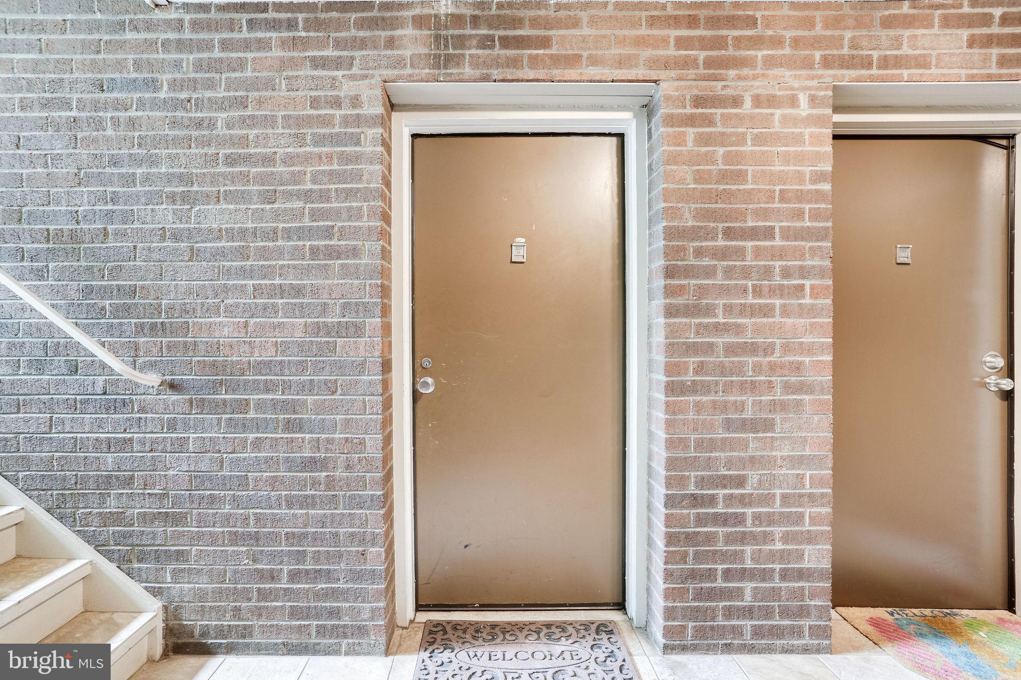 6280 Edsall Road, Unit 201 Alexandria, VA 22312 - Photo 4 of 40 Couple steps down to the unit