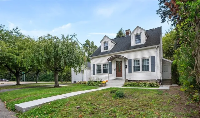 front view of a house with a yard