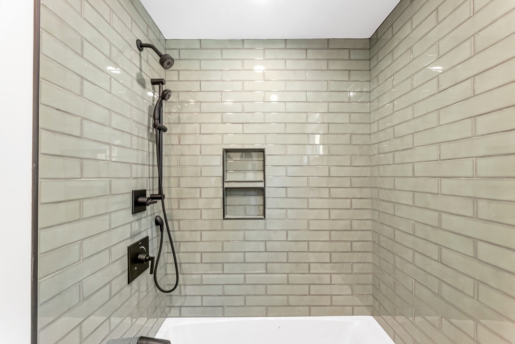 180 Dent Street Boston, MA 02132 - Photo 16 of 30 a bathroom with a shower