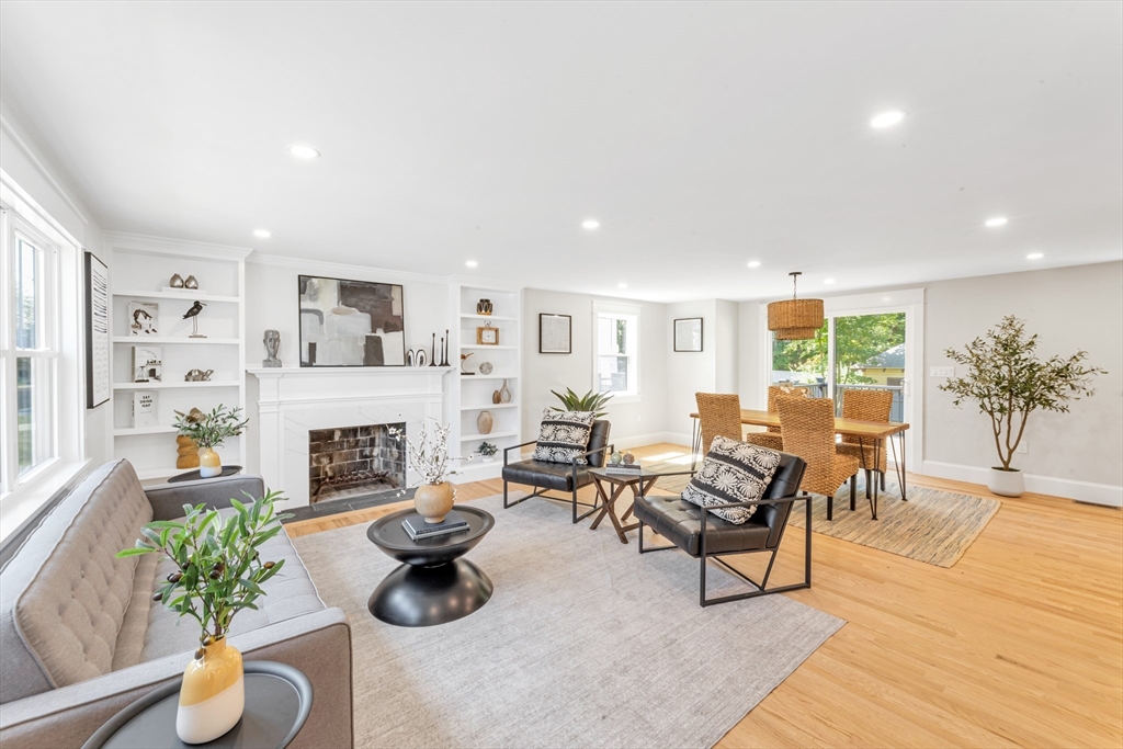 180 Dent Street Boston, MA 02132 - Photo 2 of 30 a living room with furniture and a fireplace