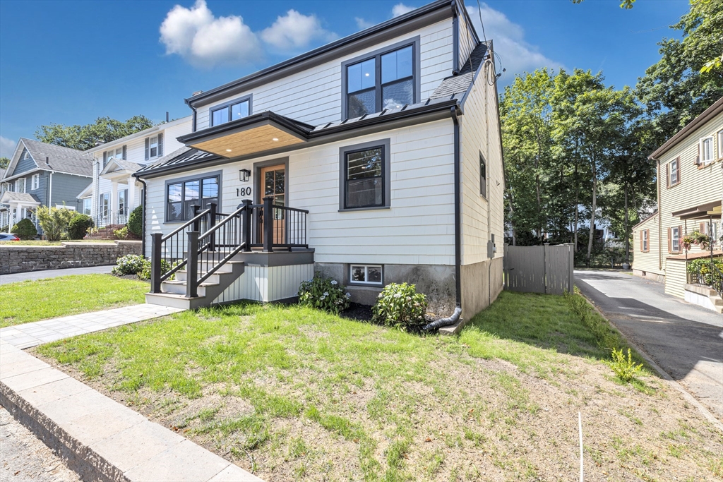 180 Dent Street Boston, MA 02132 - Photo 25 of 30 a front view of a house with garden
