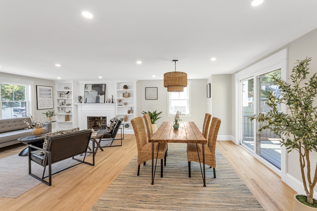 180 Dent Street Boston, MA 02132 - Photo 3 of 30 a view of a dining room with furniture and wooden floor