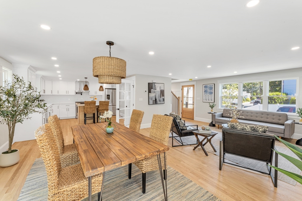 180 Dent Street Boston, MA 02132 - Photo 4 of 30 a living room with furniture and a chandelier