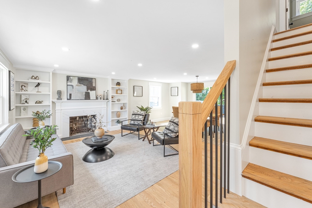 180 Dent Street Boston, MA 02132 - Photo 6 of 30 a living room with furniture and a fireplace