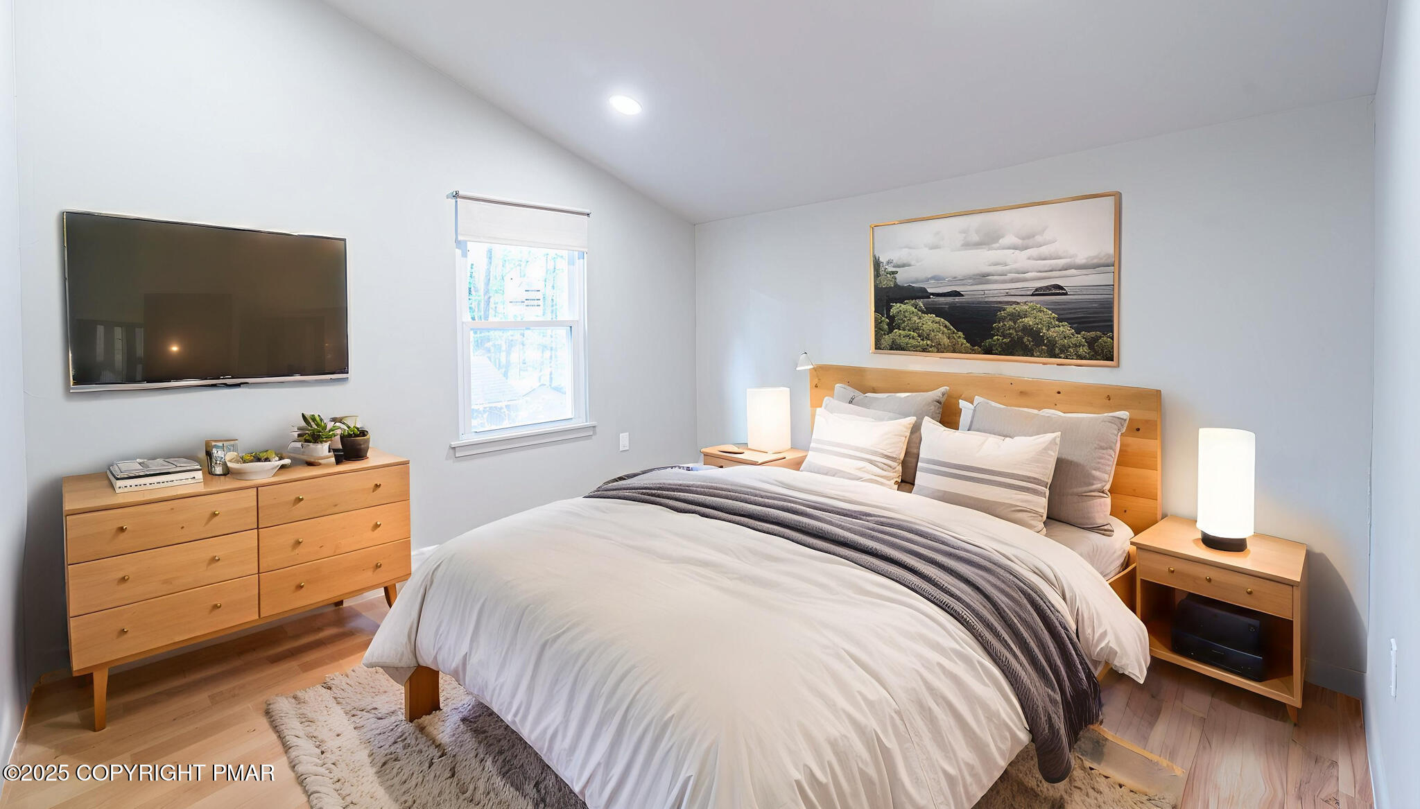 113 Netcong Circle Pocono Lake, PA 18347 - Photo 25 of 51 a bedroom with a bed and a flat screen tv