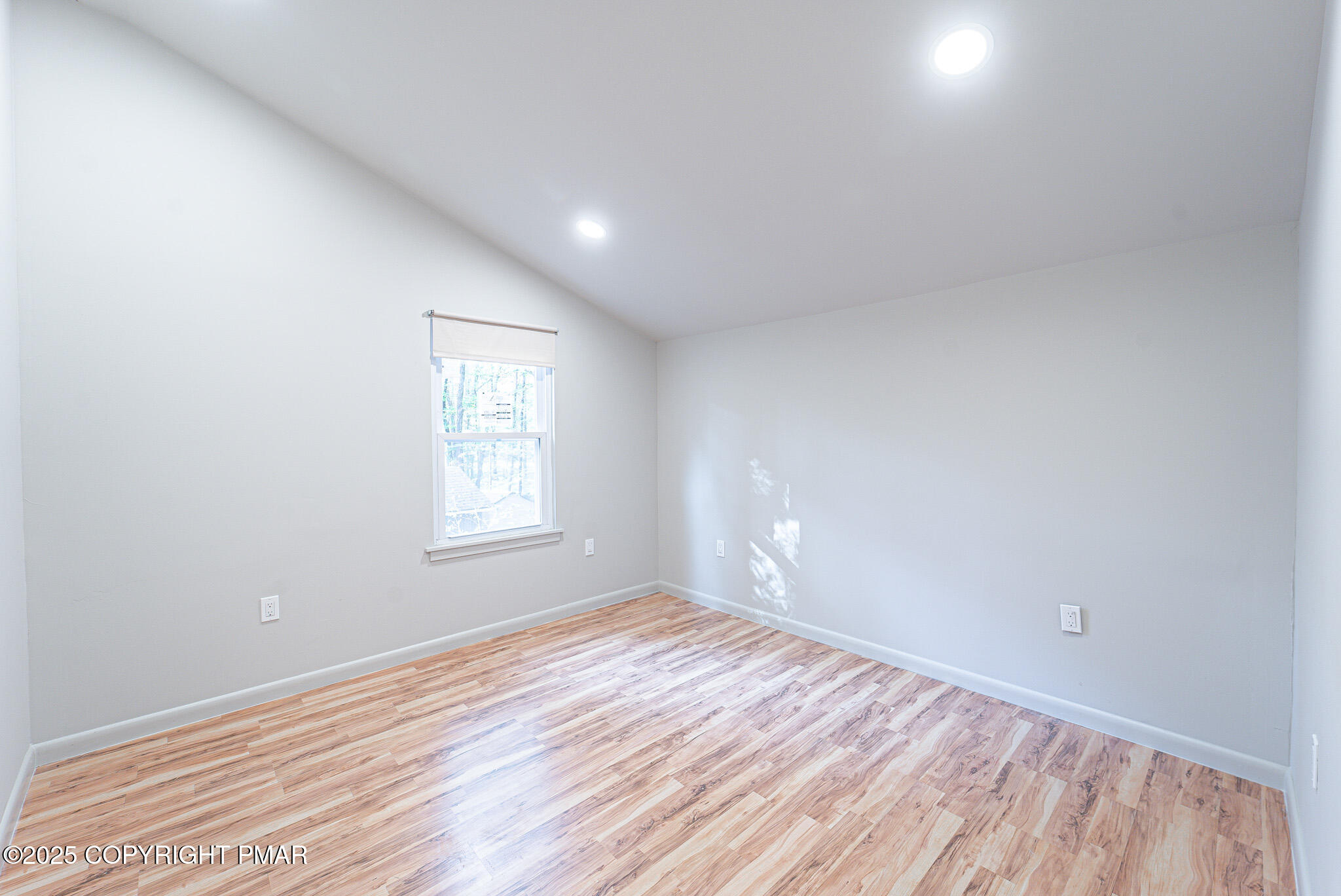 113 Netcong Circle Pocono Lake, PA 18347 - Photo 26 of 51 a view of empty room with wooden floor and fan
