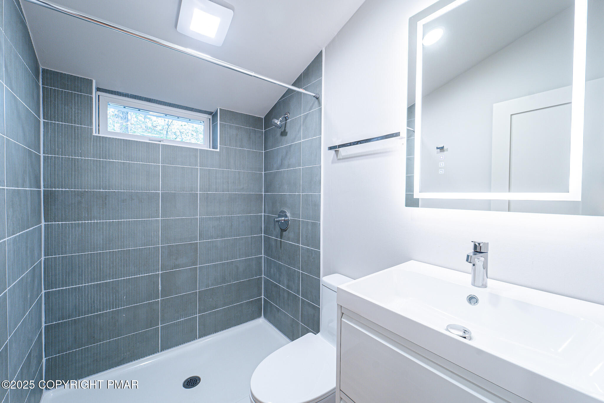 113 Netcong Circle Pocono Lake, PA 18347 - Photo 28 of 51 a bathroom with a sink toilet and shower