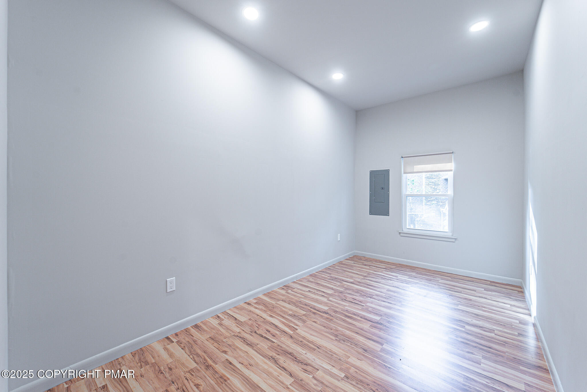 113 Netcong Circle Pocono Lake, PA 18347 - Photo 32 of 51 a view of room with wooden floor and window