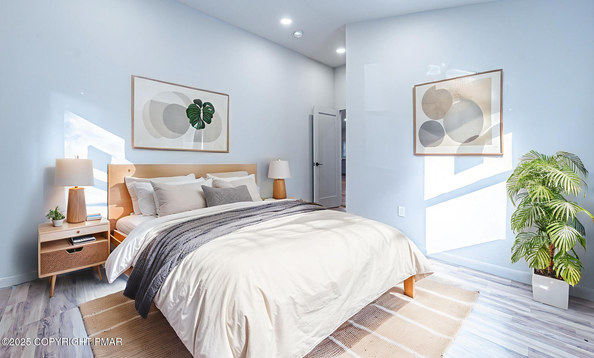 113 Netcong Circle Pocono Lake, PA 18347 - Photo 34 of 51 a bedroom with bed and painting on the wall