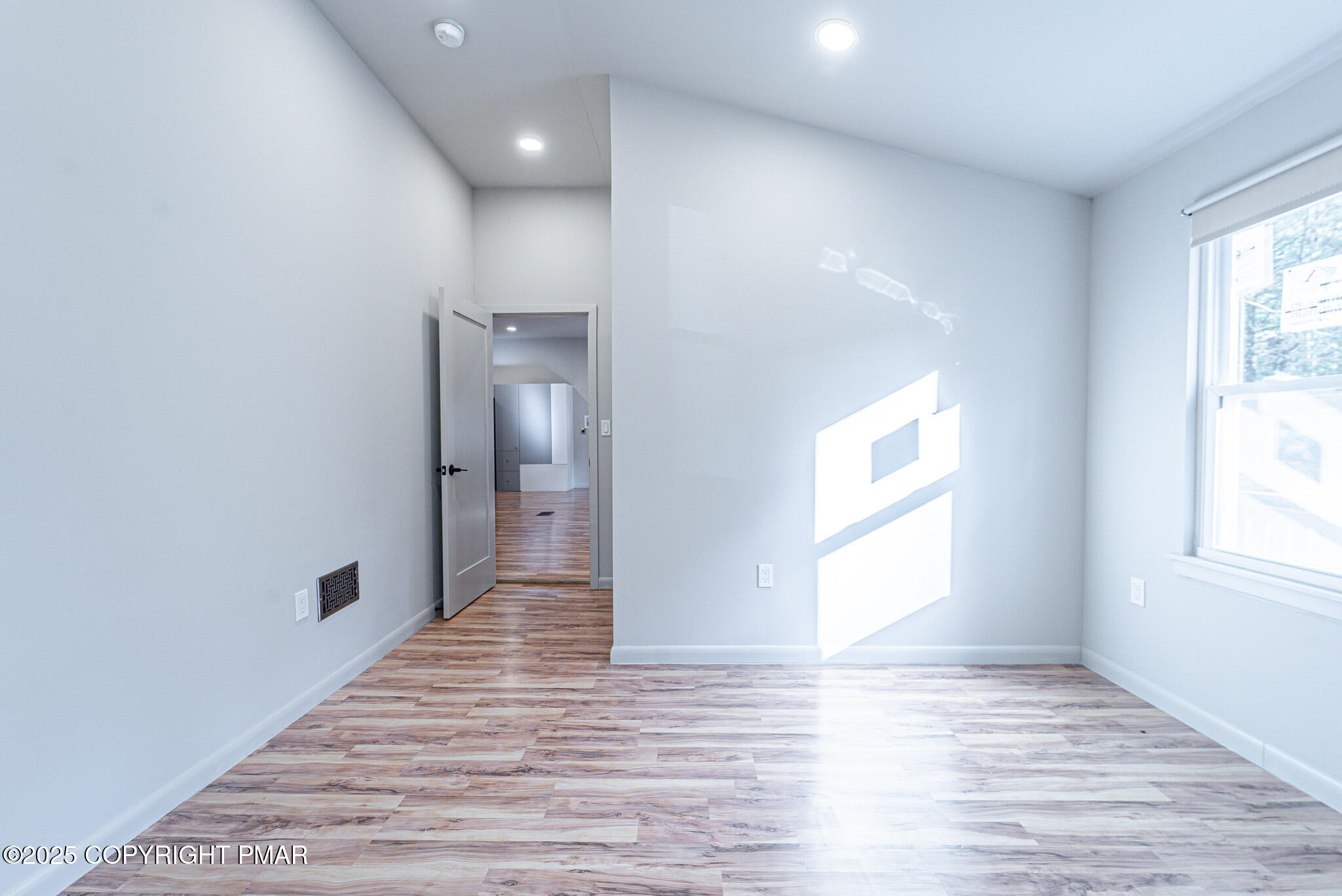 113 Netcong Circle Pocono Lake, PA 18347 - Photo 36 of 51 a view of a hallway with wooden floor and staircase