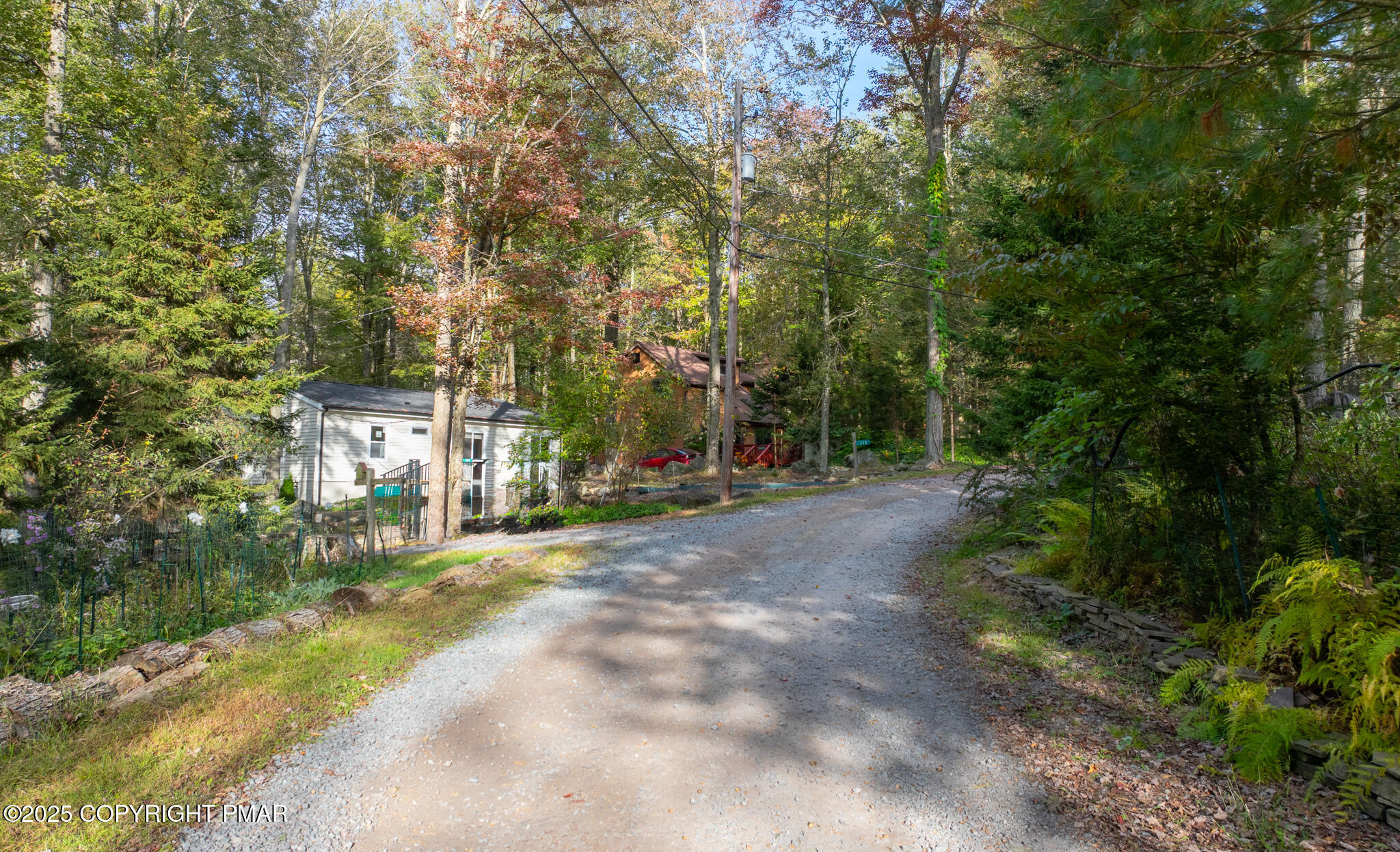 113 Netcong Circle Pocono Lake, PA 18347 - Photo 44 of 51 a view of a street with a building in the background