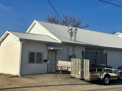 a car parked in front of a building