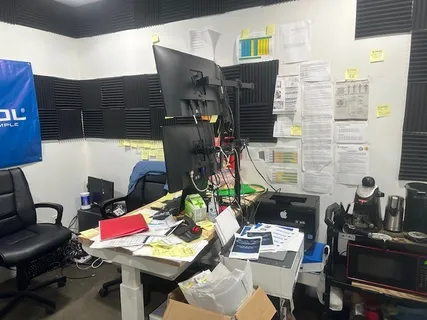 a kitchen with a table and chairs in it