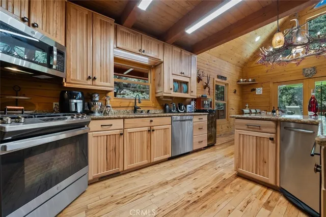 a bedroom with two beds and a walk in closet