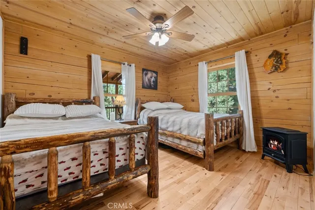 a living room with furniture and a book shelf
