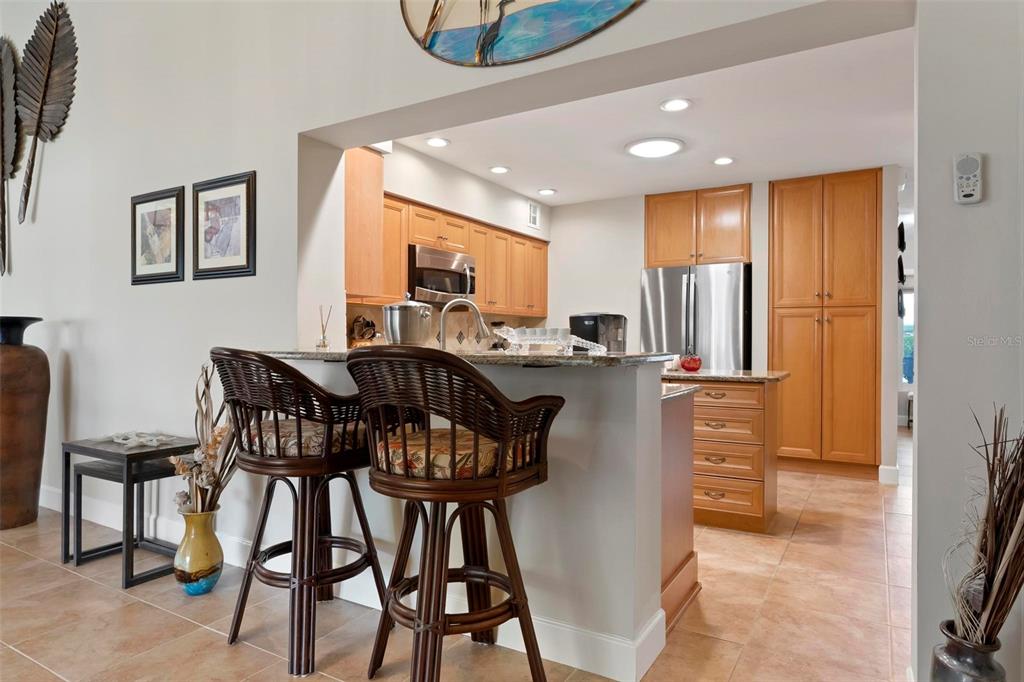 104 Alba Street West Venice, FL 34285 - Photo 11 of 42 a view of a dining room with furniture