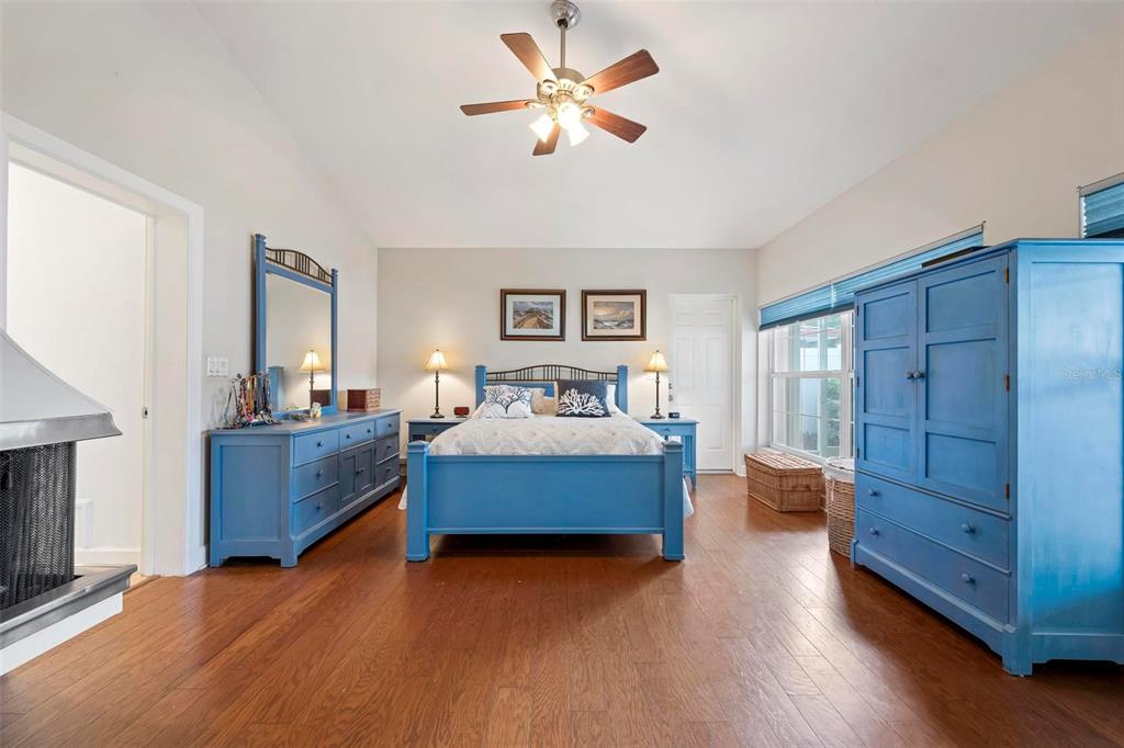104 Alba Street West Venice, FL 34285 - Photo 20 of 42 a bedroom with a bed and a dresser