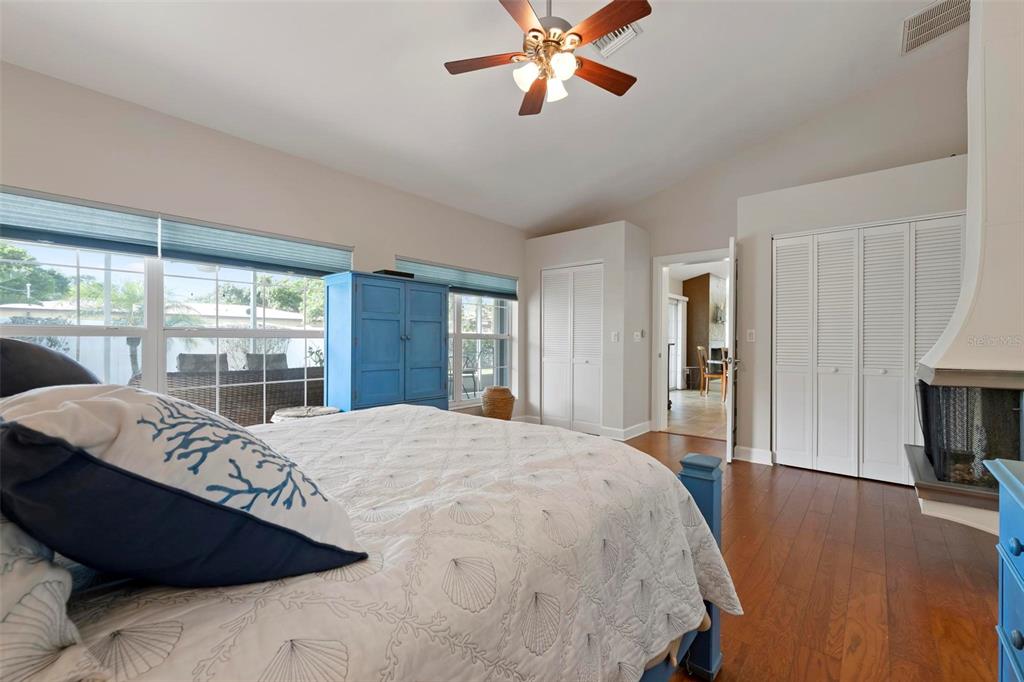 104 Alba Street West Venice, FL 34285 - Photo 24 of 42 a bed sitting in a spacious bedroom next to a window