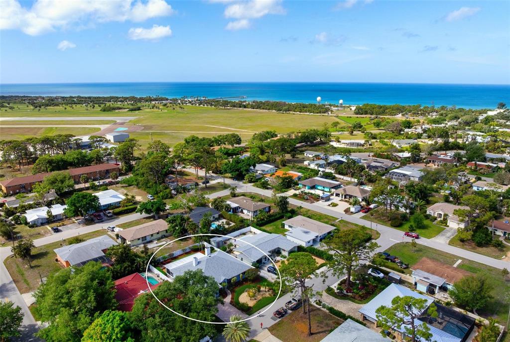 104 Alba Street West Venice, FL 34285 - Photo 40 of 42 an aerial view of residential building and lake