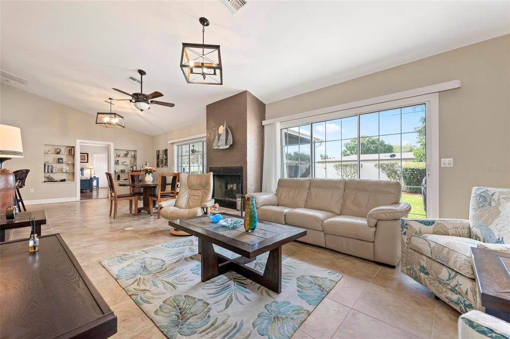 104 Alba Street West Venice, FL 34285 - Photo 6 of 42 a living room with furniture and a large window