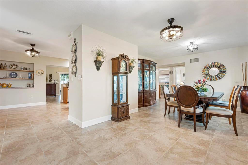 104 Alba Street West Venice, FL 34285 - Photo 7 of 42 a view of a livingroom with furniture and a chandelier