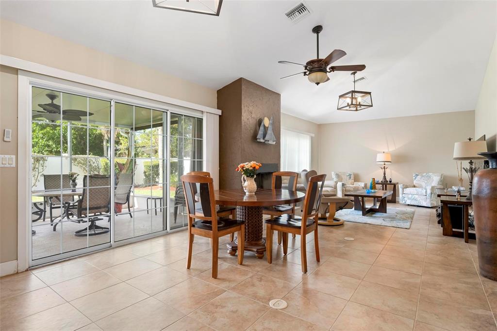 104 Alba Street West Venice, FL 34285 - Photo 10 of 42 a view of a dining area with furniture window and outside view