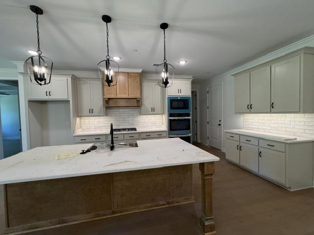 210 Drake Drive Collierville, TN 38017 - Photo 9 of 19 a kitchen with a sink a counter space appliances and cabinets