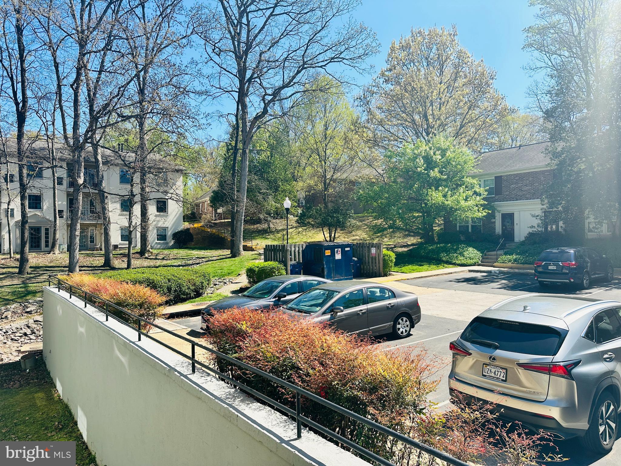 8312 Kingsgate Road, Unit 534 Springfield, VA 22152 - Photo 3 of 32 a view of a patio with chairs and a fire pit