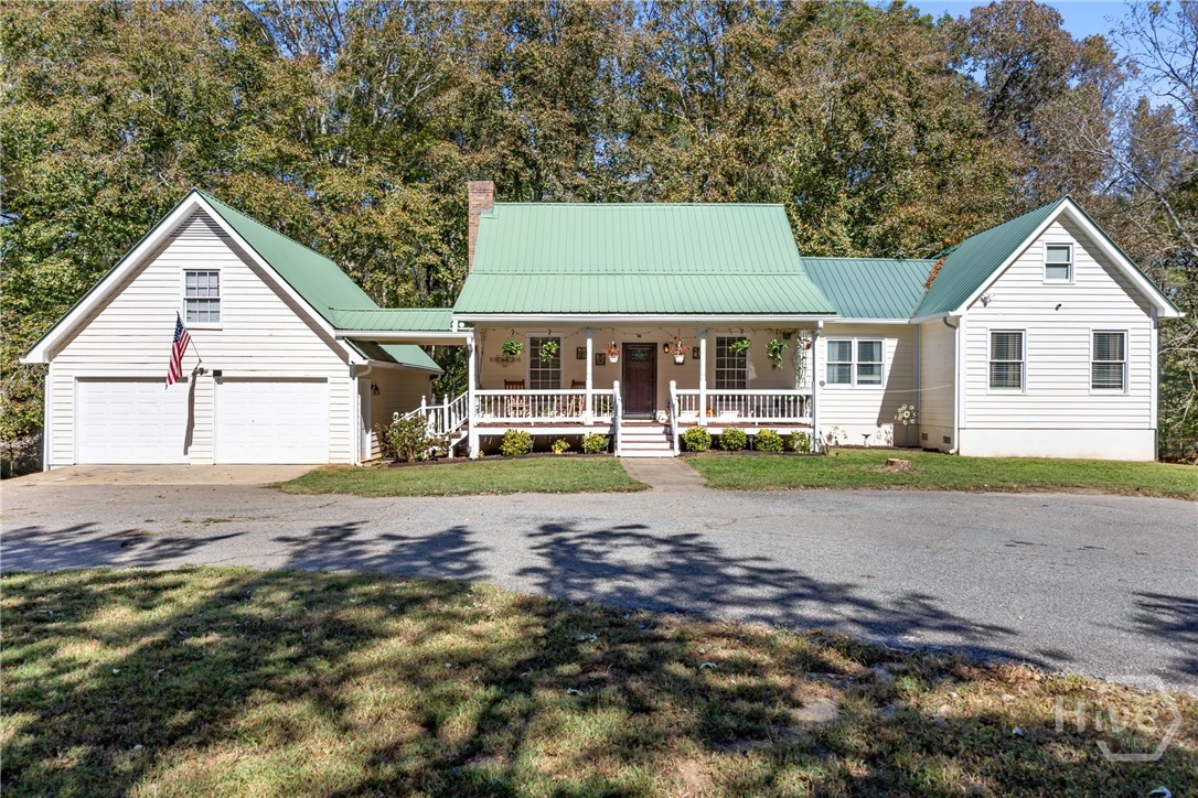 1579 Shoal Creek Road Colbert, GA 30628 - Photo 8 of 42 Farmhouse with metal roof & lots of living space
