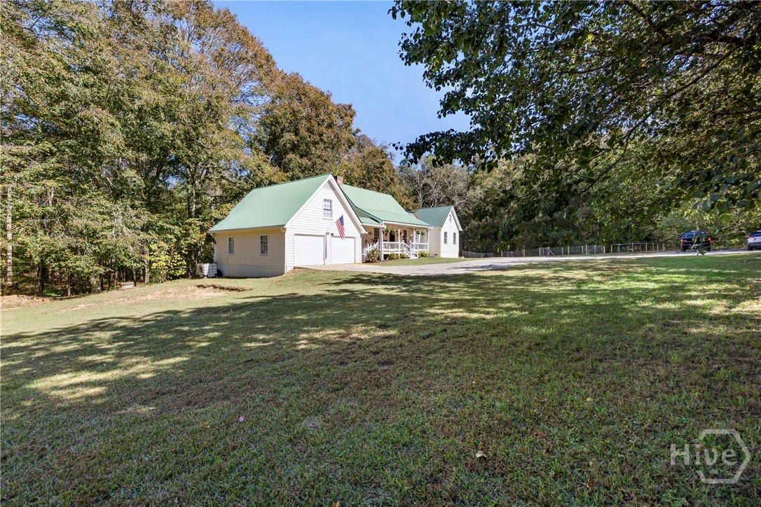 1579 Shoal Creek Road Colbert, GA 30628 - Photo 9 of 42 Extra large Garage is wired for electrical and can be storage or converted to an apartment above