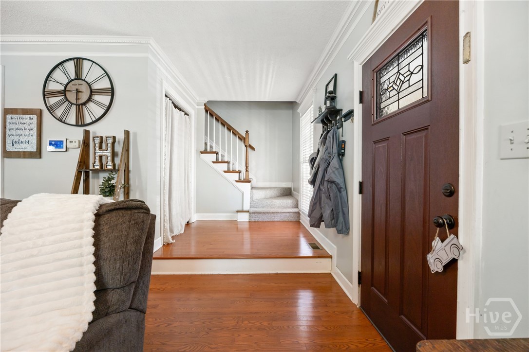 1579 Shoal Creek Road Colbert, GA 30628 - Photo 10 of 42 Large Foyer & Gleaming hardwoods