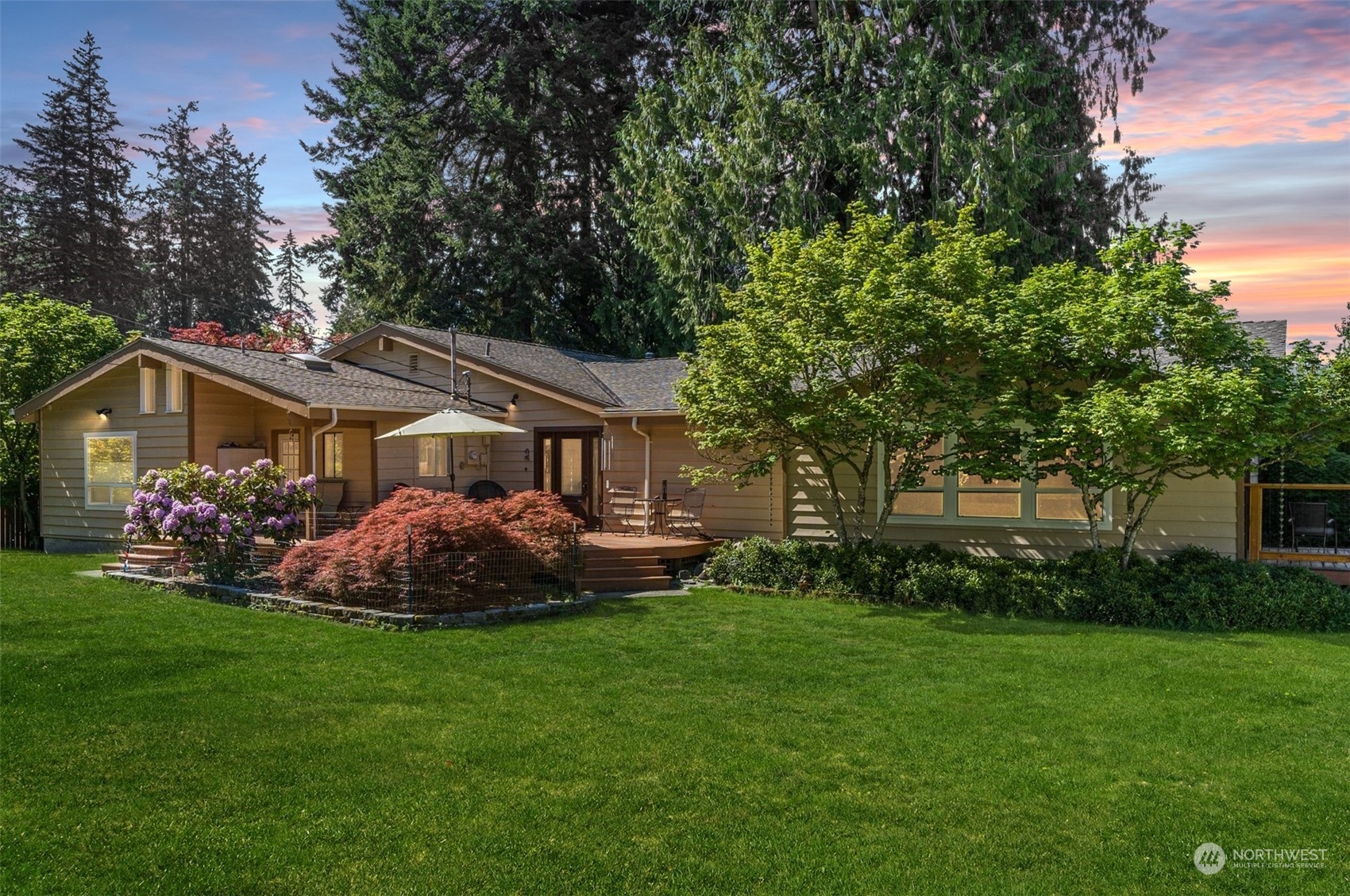 19804 Southeast 150th Street Renton, WA 98059 - Photo 1 of 40 a front view of a house with garden