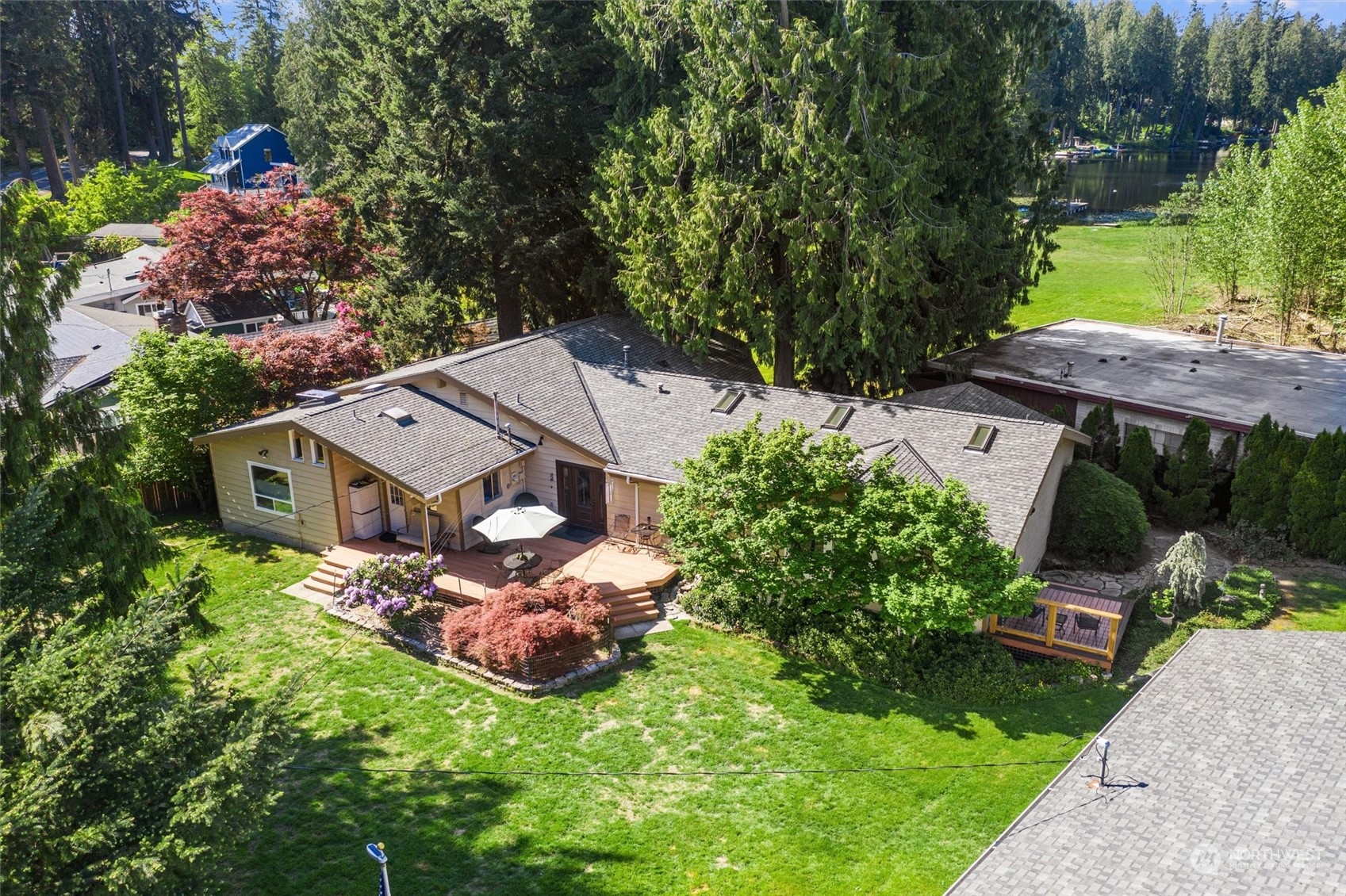 19804 Southeast 150th Street Renton, WA 98059 - Photo 2 of 40 an aerial view of a house with garden space and a street view