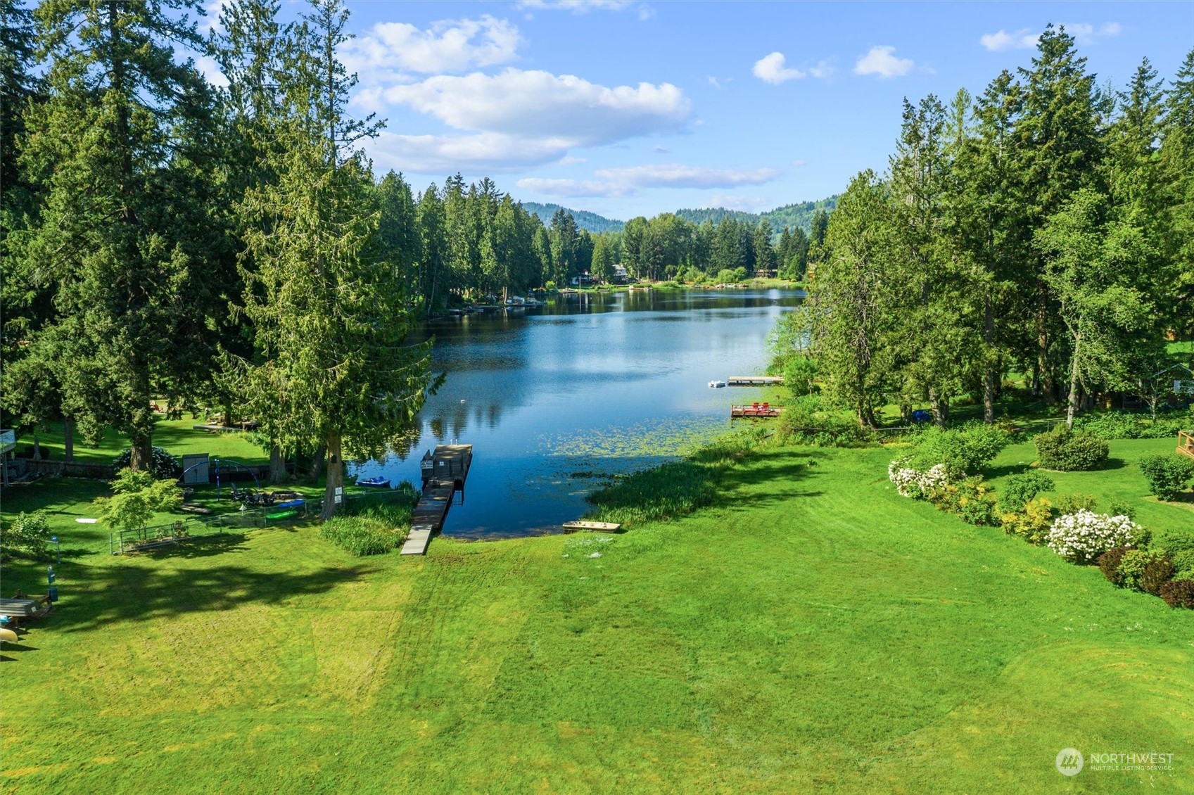 19804 Southeast 150th Street Renton, WA 98059 - Photo 25 of 40 a lake view with a garden