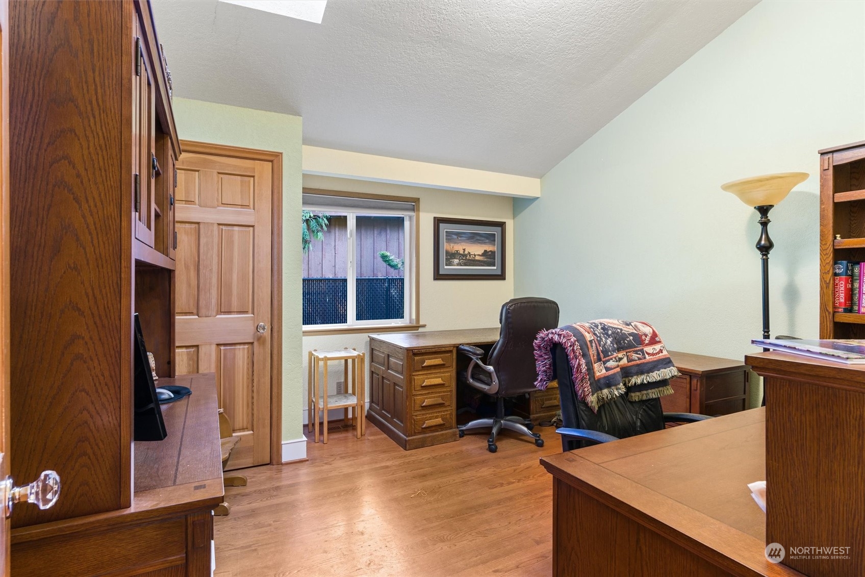 19804 Southeast 150th Street Renton, WA 98059 - Photo 30 of 40 a view of a workspace with furniture and a window