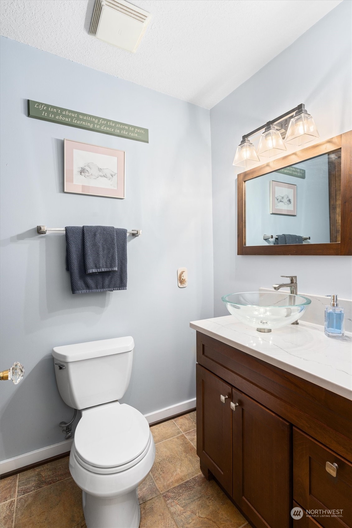19804 Southeast 150th Street Renton, WA 98059 - Photo 31 of 40 a bathroom with a toilet a sink and mirror