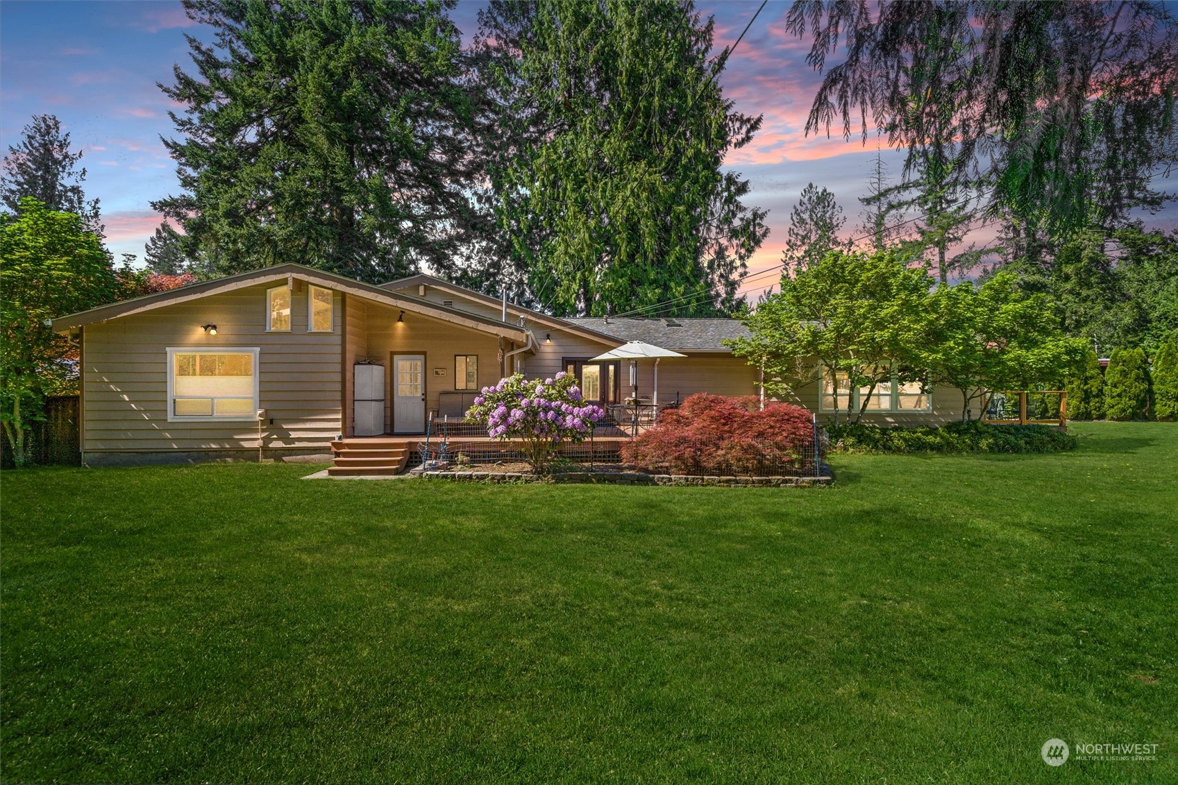 19804 Southeast 150th Street Renton, WA 98059 - Photo 34 of 40 a front view of house with yard and green space