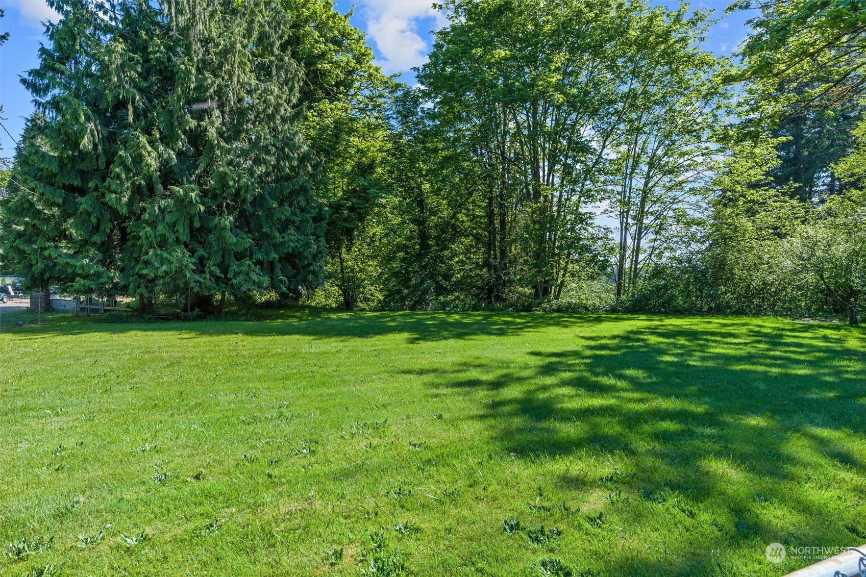 19804 Southeast 150th Street Renton, WA 98059 - Photo 39 of 40 a view of outdoor space with deck and yard