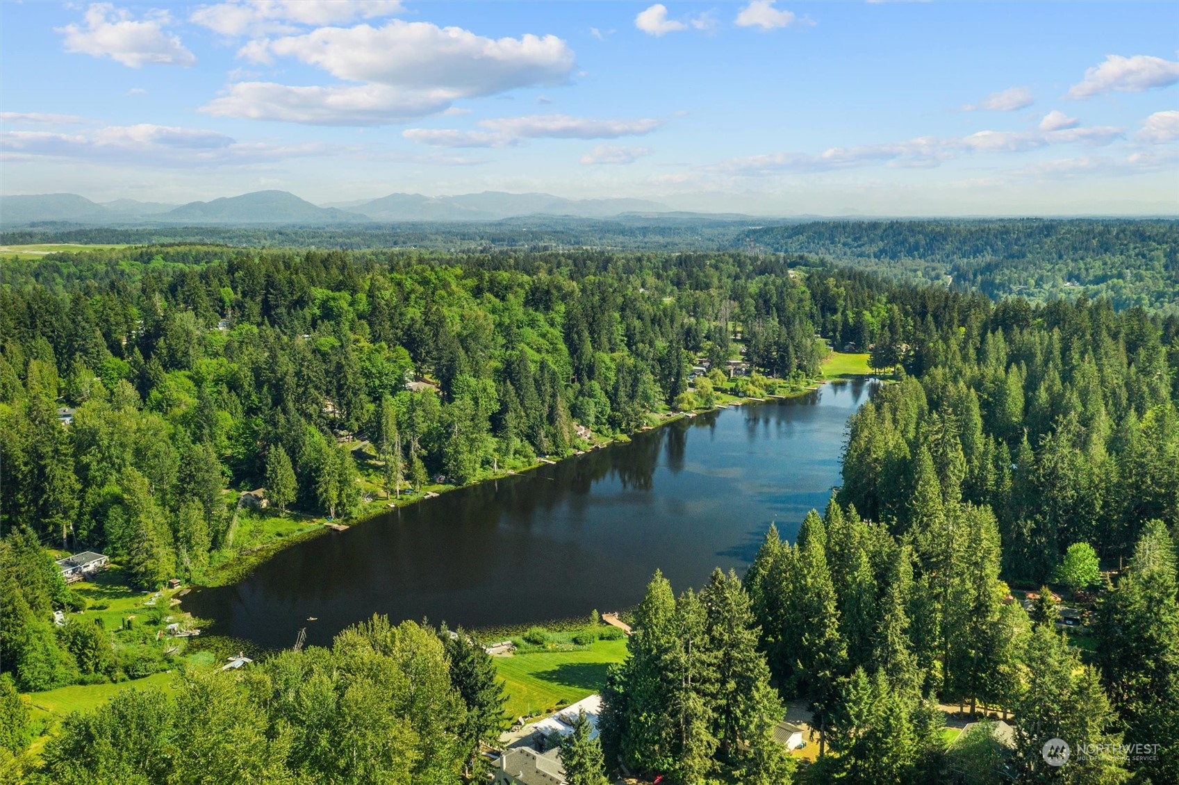 19804 Southeast 150th Street Renton, WA 98059 - Photo 6 of 40 a view of a lake with a city