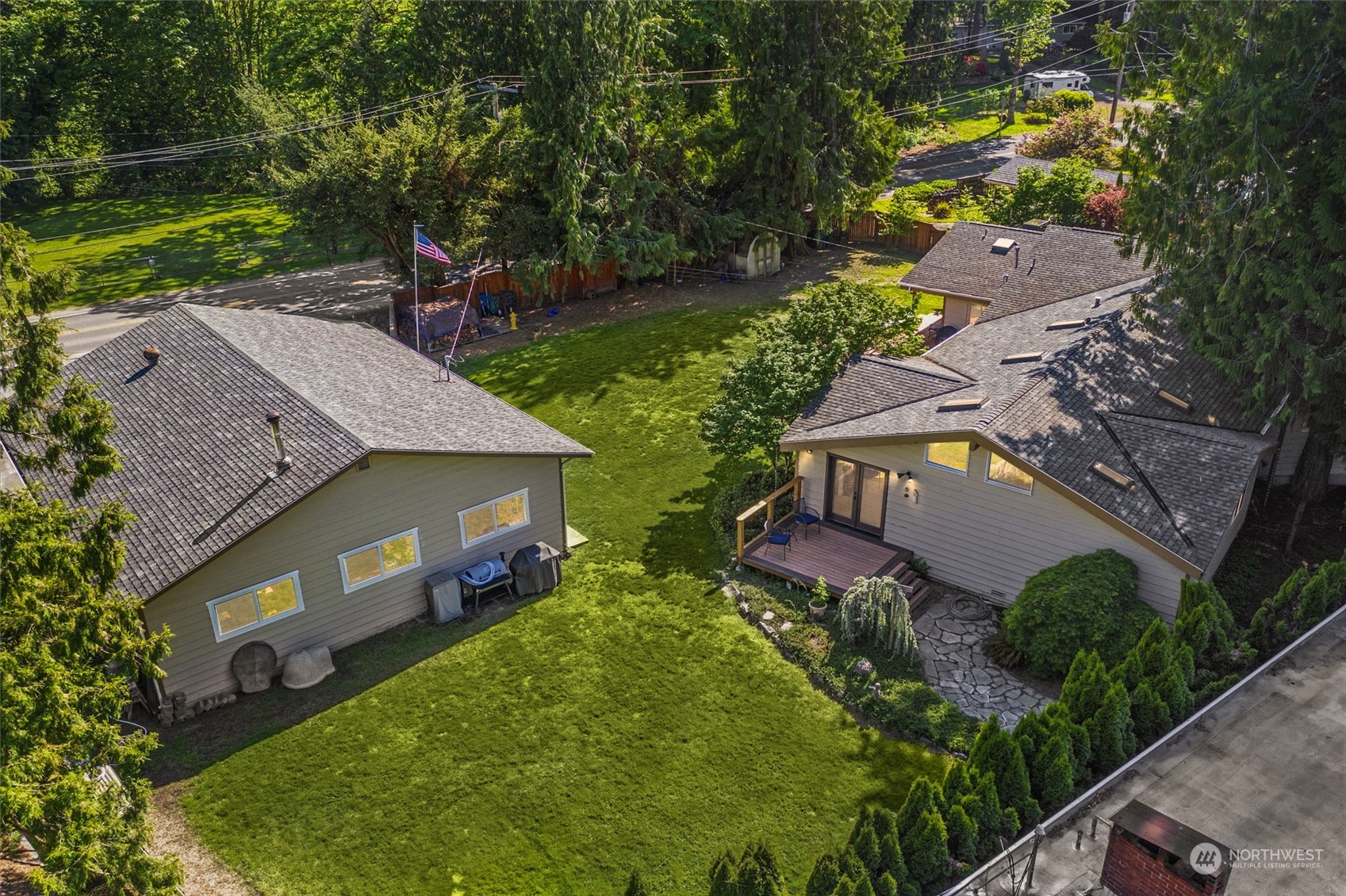 19804 Southeast 150th Street Renton, WA 98059 - Photo 7 of 40 an aerial view of a house with a garden