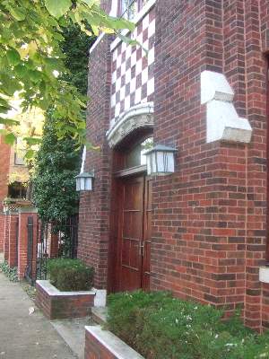 2238 North Racine Avenue Chicago, IL 60614 - Photo 1 of 1 a brick building with a yard