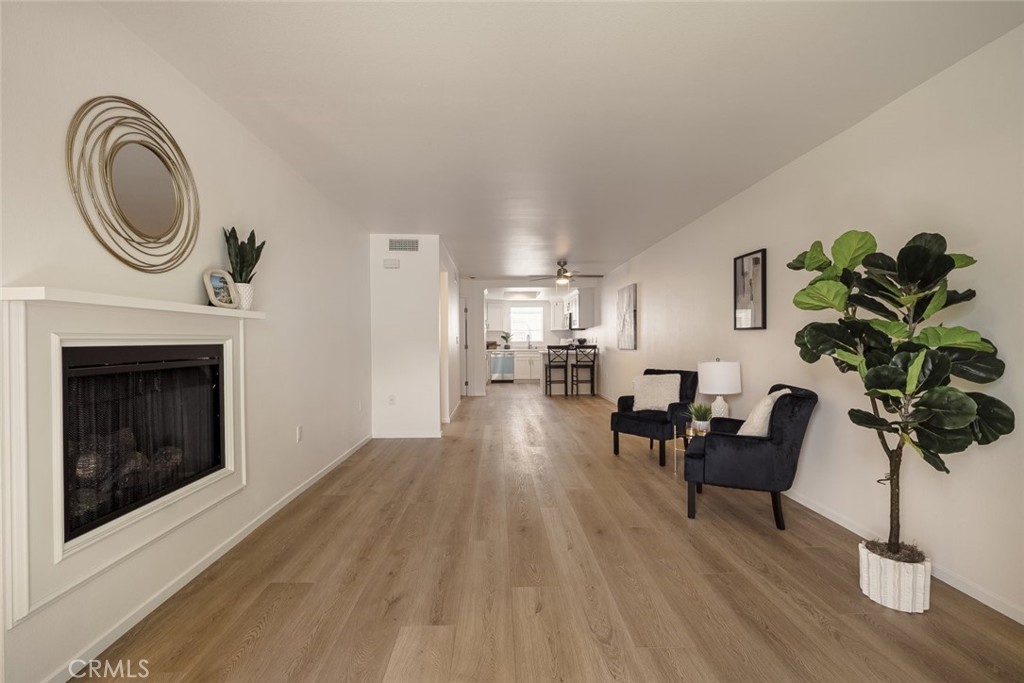 26941 Rainbow Glen Drive, Unit 751 Santa Clarita, CA 91351 - Photo 16 of 34 a living room with furniture and a fireplace