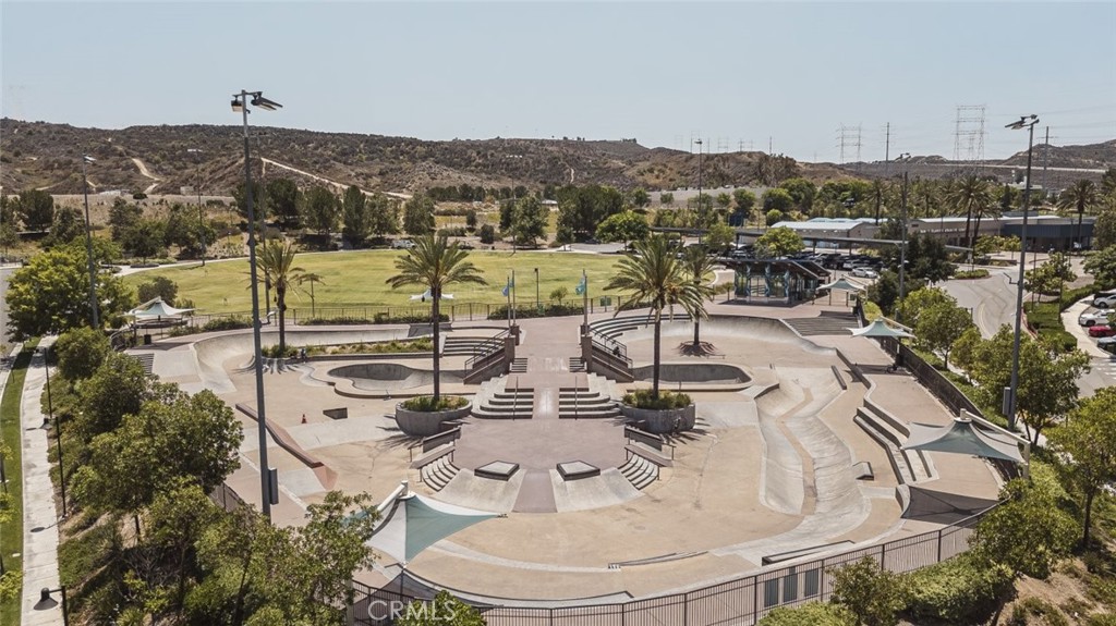 26941 Rainbow Glen Drive, Unit 751 Santa Clarita, CA 91351 - Photo 33 of 34 a view of a terrace with furniture and city view