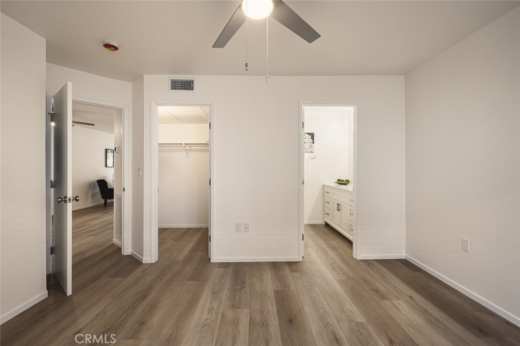 26941 Rainbow Glen Drive, Unit 751 Santa Clarita, CA 91351 - Photo 10 of 34 wooden floor in an empty room