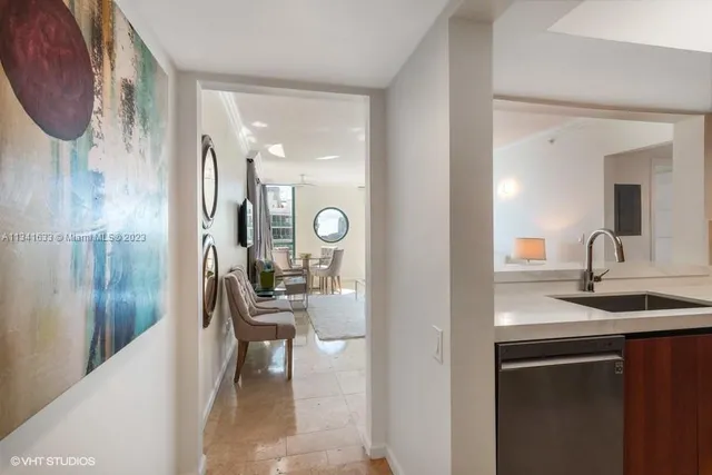 a en suite bathroom with a sink a mirror and a shower