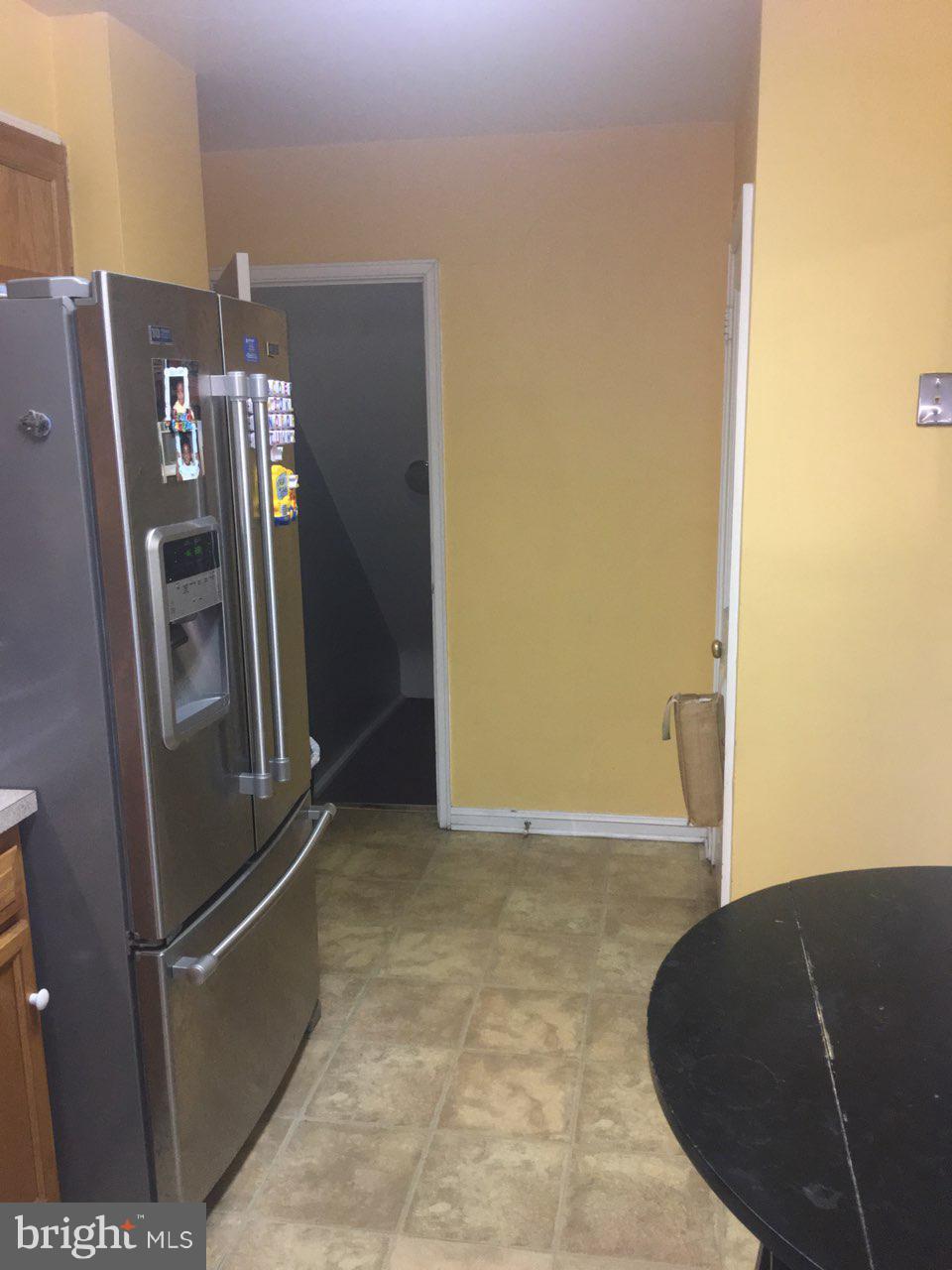 1728 Ingram Road Baltimore, MD 21239 - Photo 12 of 44 a view of a refrigerator in kitchen