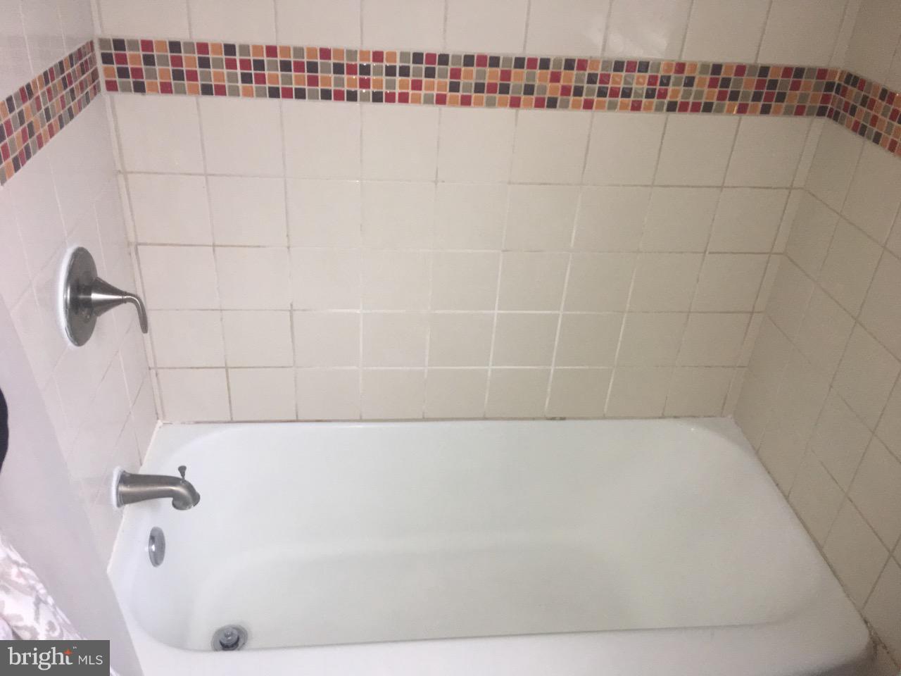 1728 Ingram Road Baltimore, MD 21239 - Photo 23 of 44 a bathroom with a bathtub
