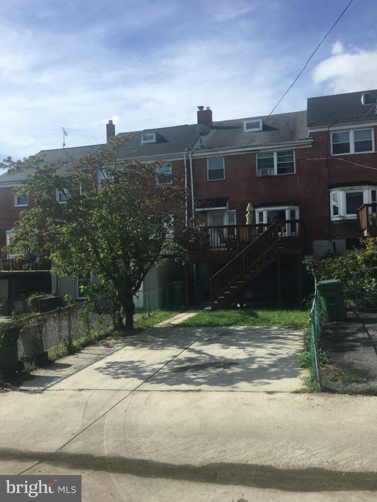 1728 Ingram Road Baltimore, MD 21239 - Photo 4 of 44 a view of a house with a yard